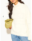 Relaxed-fit Roll- neck Jumper with open-work design in Cream