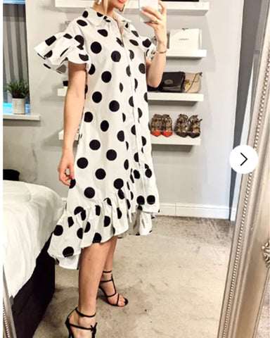 Polka Dot print dip hem dress with frill sleeves design in black white color