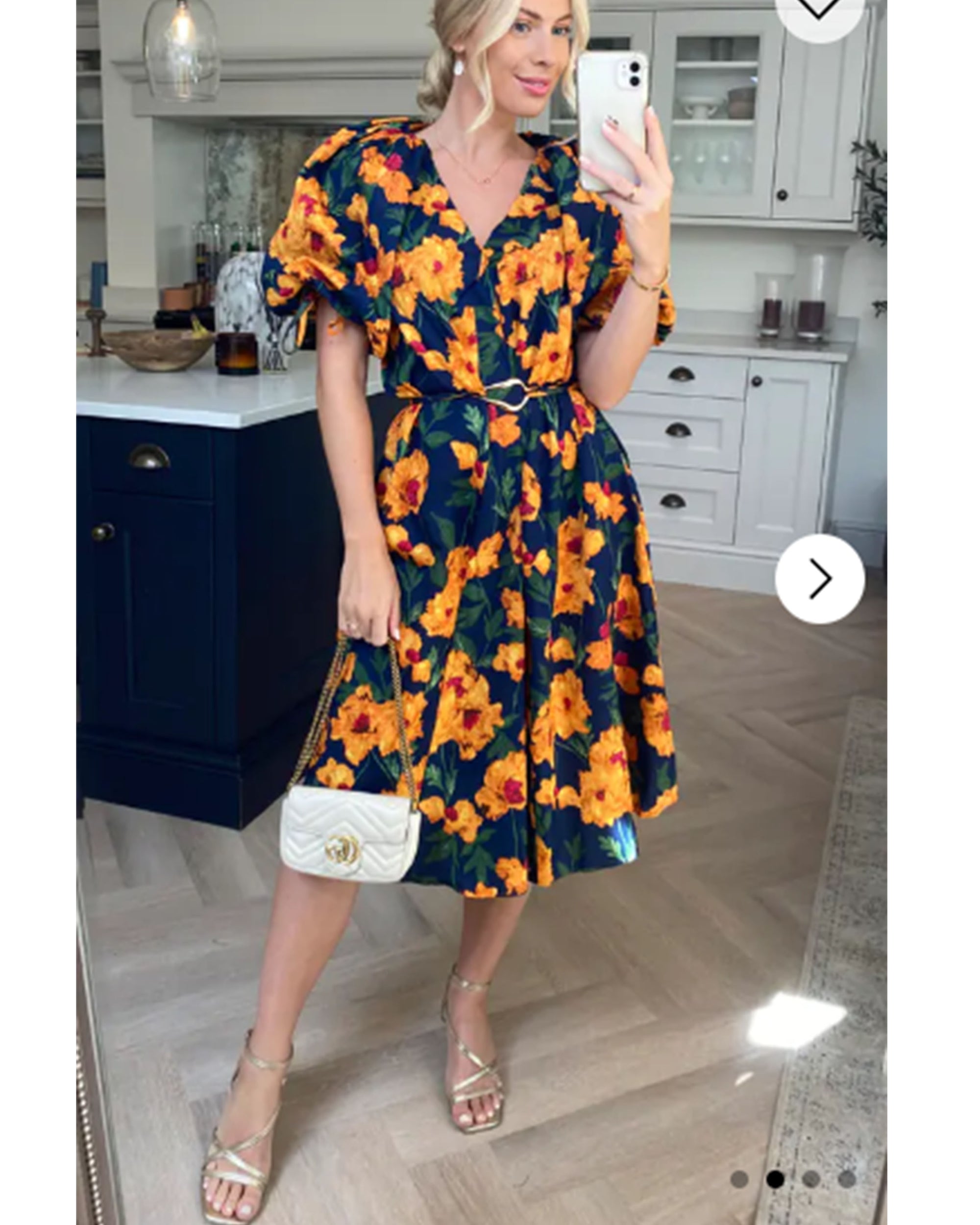 Oversized puff sleeve midi dress in Multi color floral print