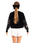 Sequin embellished with stars design knit jumper in black