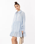 Blue color Oversized shirt dress in pop pattern fabric in ruffle hem design