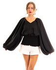 Puff sleeve smocked top in black